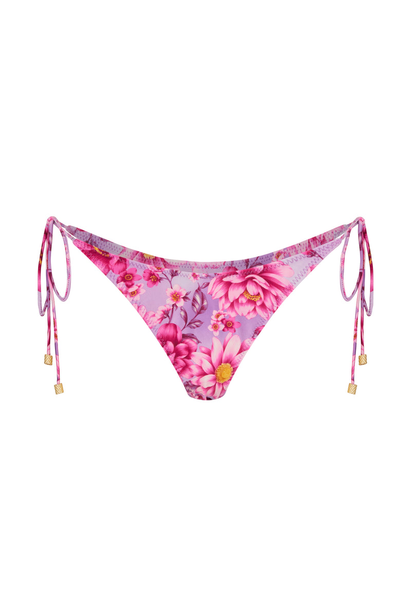 A tie side bikini bottom with a pink floral print, featuring gold brushed vintage effect toggles and a Brazilian cut.