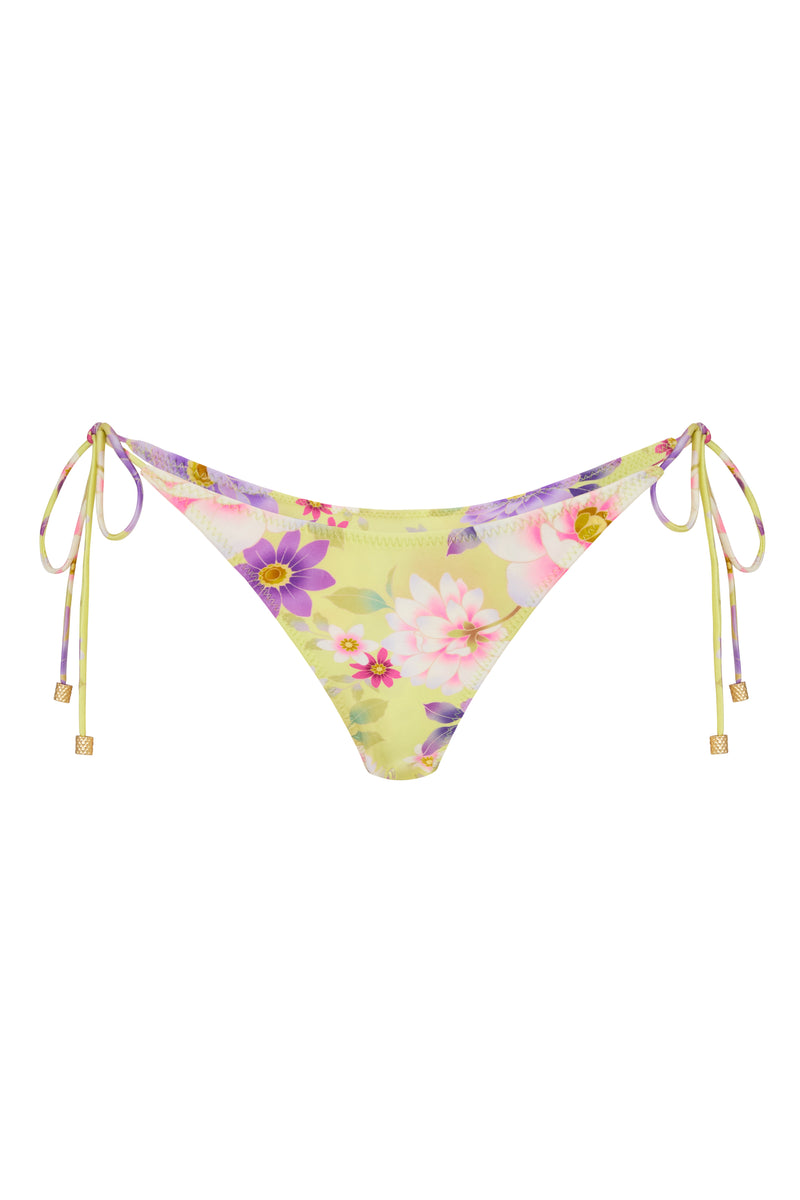 A tie side bikini bottom with a yellow floral pattern, featuring gold brushed vintage effect toggles and a low waist design.