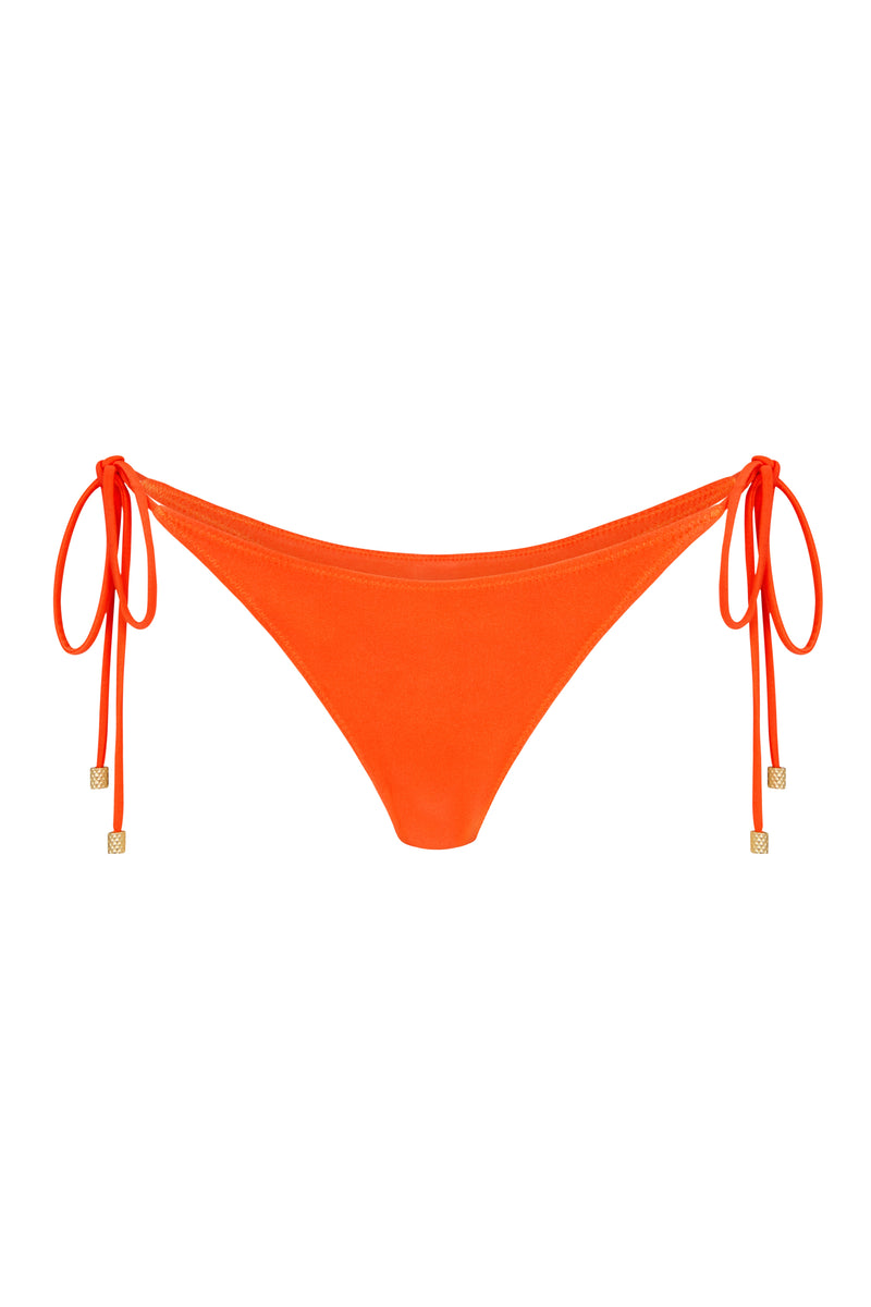 An orange tie side bikini bottom with gold brushed toggles and a low waist cut.